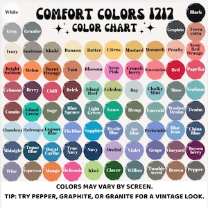 May include: A Comfort Colors 1717 color chart featuring a grid of circular paint swatches in various shades. The text reads: Comfort Colors 1717 Color Chart, Colors may vary by screen, Tip: Try Pepper, Graphite, or Granite for a vintage look.