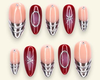 Chrome Eclipse: Silberne French Tips und Rote Starburst Presse auf den Nägeln