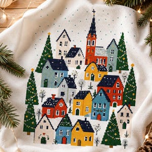 Peut inclure: Une pièce de tissu blanc présentant un motif au point de croix d'un village d'hiver. Le design comprend des maisons colorées en rouge, jaune, bleu et blanc, entremêlées de sapins verts décorés de petites étoiles et de points jaunes.