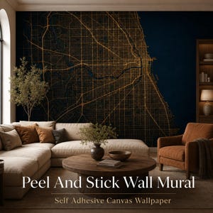 May include: A peel and stick wall mural featuring a detailed city map with gold lines on a dark navy blue background. The map displays a grid of streets and highways, covering the entire wall surface behind a living room furniture arrangement.