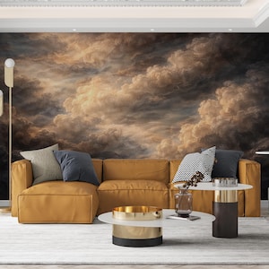 May include: A modern living room featuring a mustard-colored sectional sofa, accented with throw pillows in shades of gray and black. A large mural of a cloudy sky serves as a backdrop. The room includes a white rug, coffee tables, and floor lamps.