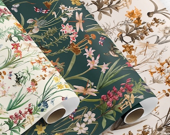 May include: Rolls of floral patterned wallpaper in cream, evergreen, and sepia tones. The designs feature botanical illustrations of flowers, dragonflies, and other natural elements. Color swatches are included. Text on the image reads "CREMA", "EVERGREEN", and "SEPIA".