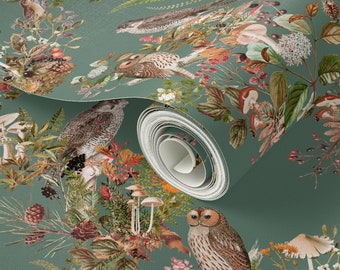 May include: A roll of wallpaper featuring a detailed forest scene with birds, mushrooms, and foliage in shades of green, brown, and orange. The design includes an owl, a nest with eggs, and various plants.
