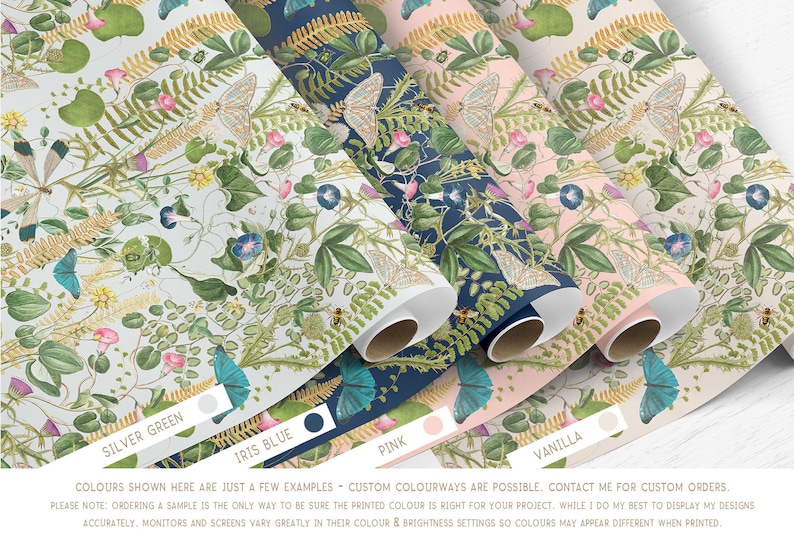 May include: Five rolls of wrapping paper with a floral pattern featuring butterflies, leaves, and flowers. The rolls are labeled with the colors: Silver Green, Iris Blue, Pink, and Vanilla.