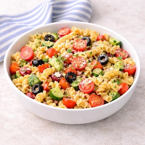 May include: A white ceramic mug with a black handle and the text "But First, Coffee" in a black, bold font. The mug is on a white surface.