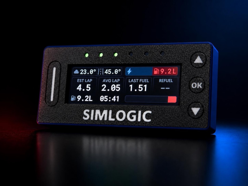 May include: A black rectangular Simlogic digital dashboard display with a textured finish. The screen shows racing telemetry data including lap times, fuel levels, and weather icons. It features physical navigation buttons and indicator lights.