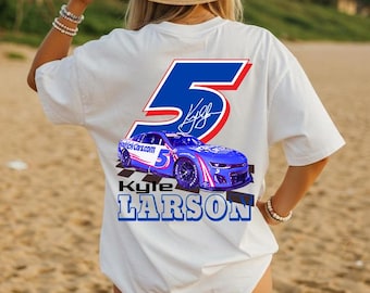 May include: White t-shirt featuring a blue and red number 5 graphic, a blue race car, and the name "Kyle Larson" in blue block letters. The shirt also includes the text "kylelarson.com".