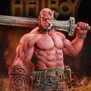 May include: A detailed figure of Hellboy, a red-skinned demon, holding a large sword. He has a muscular build, a goatee, and a cigar in his mouth. The background features the word "HELLBOY" in gold lettering.