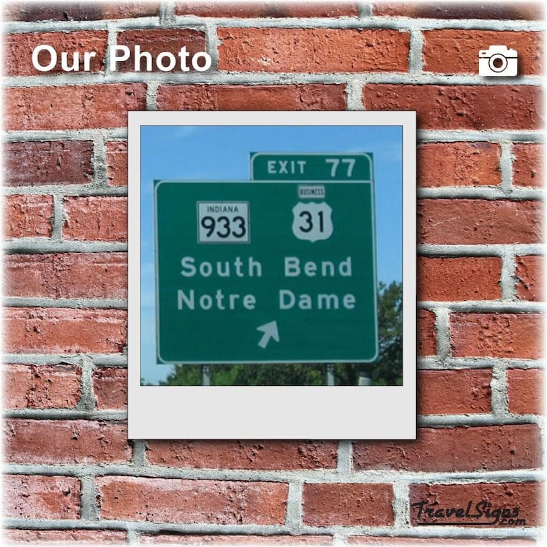 Notre Dame exit sign wall decor — green aluminum road sign featuring South Bend Notre Dame and Exit 77.
