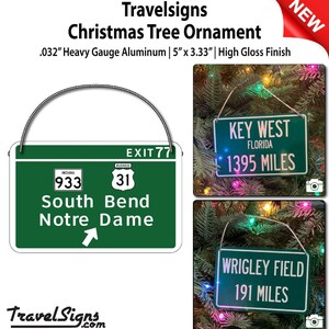 Notre Dame exit sign wall decor — green aluminum road sign featuring South Bend Notre Dame and Exit 77.