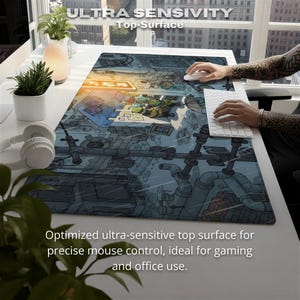 May include: A rectangular mouse pad with a detailed cartoon illustration in shades of blue, gray, and yellow. The design features a cityscape with pipes and buildings. The text "ULTRA SENSITIVITY Top-Surface" is at the top. The text "Optimized ultra-sensitive top surface for precise mouse control, ideal for gaming and office use." is at the bottom.