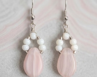 Delicate acrylic pearl arches and marbled pink drops, stainless steel hooks, romantic lightweight elegance