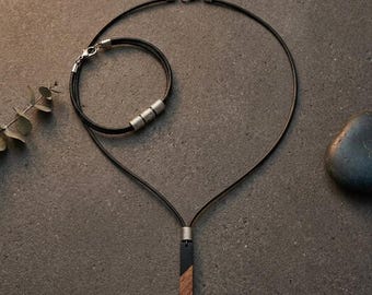 Minimalist geometric necklace and double leather bracelet set with walnut wood, black resin, and stainless steel accents