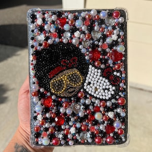 May include: A set of three ceramic mugs with a speckled, matte finish. The mugs are in shades of cream, light gray, and dark gray. Each mug has a simple, minimalist design and a rounded handle.