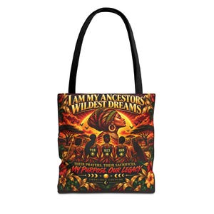 May include: A black tote bag featuring a vibrant graphic print of a person in a headwrap, four figures with numbers 918, 813, and 888, and the text I AM MY ANCESTORS' WILDEST DREAMS, THEIR PRAYERS. THEIR SACRIFICES. MY PURPOSE. OUR LEGACY. CONSCIOUS COUTURE.