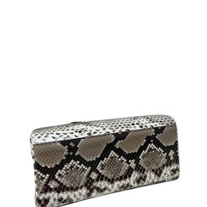 May include: A white ceramic mug with a black handle and the text "But First, Coffee" in a black, bold font. The mug is on a white surface.