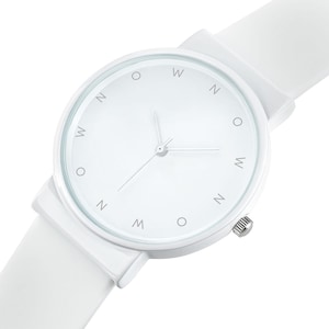 May include: A white wristwatch with a white strap. The watch face is white with silver hands and the letters "W", "N", and "O" marking the hours. The watch has a silver crown.