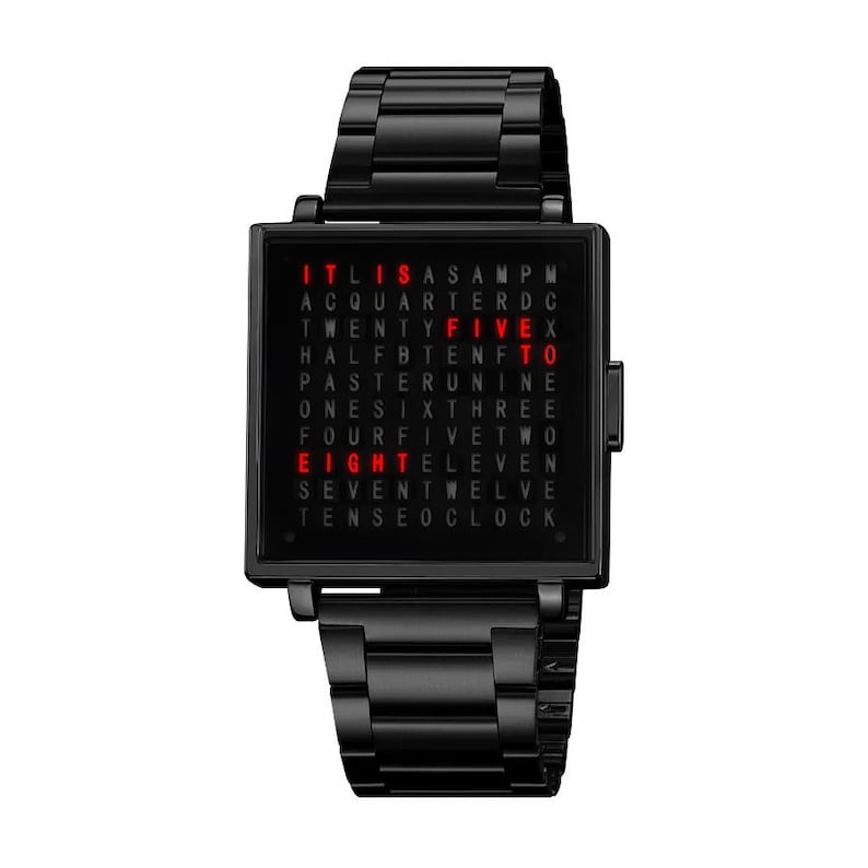 May include: Black wristwatch with a square face displaying time in words. The watch face has red illuminated text against a black background. The watch band is also black and made of metal.