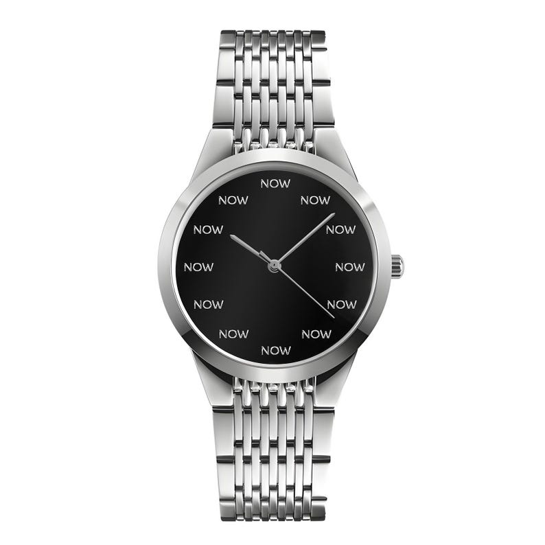 May include: A silver wristwatch with a black watch face. The watch face has the word "NOW" in white text at each hour marker. The watch has a silver band and a silver case.