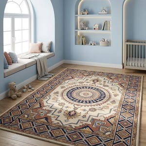 May include: A rectangular rug with a central medallion design in cream, brown, and navy blue. The rug has a geometric border and floral accents, suitable for a living room or bedroom.