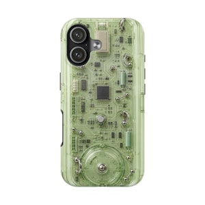 May include: A light green translucent phone case featuring a detailed internal circuit board design with visible electronic components, microchips, and metallic studs. The case has a dual-lens camera cutout and a clear, technical aesthetic.