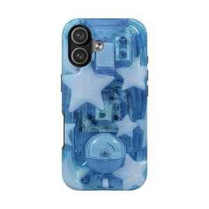 May include: A translucent blue smartphone case featuring a visible internal circuit board design. The case is decorated with multiple opaque white star shapes of varying sizes and includes a circular blue component near the bottom center.