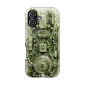 May include: A clear phone case featuring a printed circuit board design with integrated green foliage and small plants. The graphic includes electronic components, wires, and a central circular dial, all rendered in shades of light green and grey.