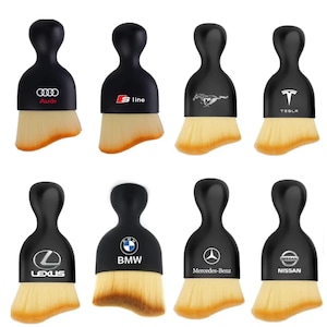 May include: A set of three ceramic mugs with a speckled, matte finish. The mugs are in shades of cream, light gray, and dark gray. Each mug has a simple, minimalist design and a rounded handle. Perfect for coffee or tea.