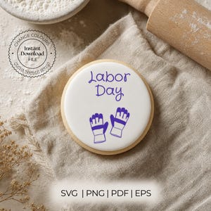 May include: A round white cookie featuring the purple text Labor Day and a graphic of two work gloves. The design includes a circular stamp with the words Change Colours Instant Download File and the text SVG PNG PDF EPS at the bottom.