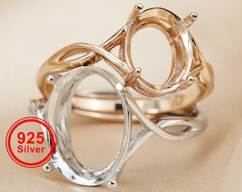 May include: A silver and gold ring with two oval-shaped settings. The ring is designed with a twisted band and is marked "925 Silver".