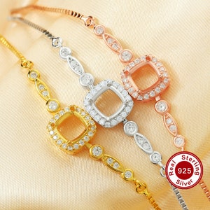 May include: Three sterling silver bracelets in gold, silver, and rose gold. Each bracelet features a square setting surrounded by small, clear gemstones. The bracelets have delicate chain links and are displayed on a satin surface.