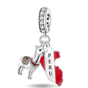 May include: A silver charm featuring a llama and a map of Peru. The charm depicts a llama with a colourful saddle and a red and white map of Peru, with the word "PERU" in black. The top of the charm has a ring with clear stones.