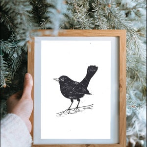 A4 original linocut print of a blackbird