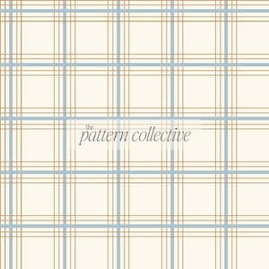May include: A cream-coloured plaid pattern with light blue and gold lines. The design features a grid of intersecting lines, creating a classic, geometric look. The text "the pattern collective" is in the lower centre of the image.