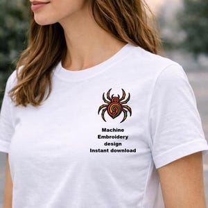 May include: A white ceramic mug with a black handle and the text "But First, Coffee" in a black, handwritten-style font. The mug is on a white surface.