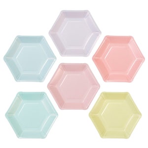 May include: Six pastel-colored hexagon-shaped paper plates. The plates are in shades of light blue, pink, yellow, and purple.