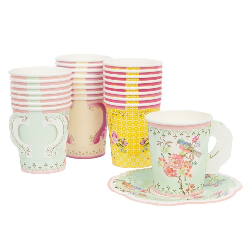 May include: Set of pastel-colored paper teacups and saucers with floral and bird designs. The cups have handles and the saucers have scalloped edges.