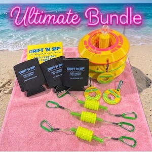 May include: A beach-themed bundle featuring a yellow and pink floating drink holder, black drink koozies, and neon green accessories. The text "Ultimate Bundle" is displayed in pink neon. The items are arranged on a pink towel with a beach background.