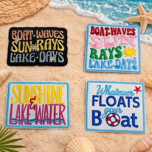 May include: Four embroidered patches with beach-themed text. The patches feature phrases like "Boat Waves," "Sunshine Lake Water," and "Whatever Floats Your Boat." Each patch has a different color scheme, including blue, pink, yellow, and white.