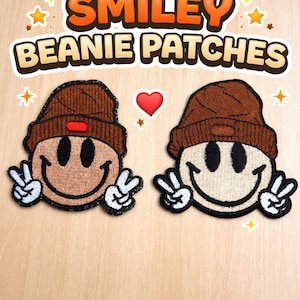 May include: Two embroidered patches featuring smiley faces wearing brown beanies and giving the peace sign. The patches have black outlines and white details. The text "SMILEY BEANIE PATCHES" is displayed above the patches.