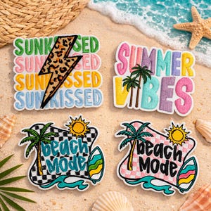 May include: Four colorful embroidered patches with summer themes. One patch says "Sunkissed" with a leopard print lightning bolt. Another says "Summer Vibes" with palm trees. The other two say "Beach Mode" with surfboards.