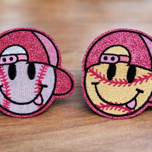 May include: A handmade wooden sign with the text "Welcome" in a handwritten style. The sign is painted white with a distressed finish and features a small, decorative heart. Measures approximately 12 inches wide.