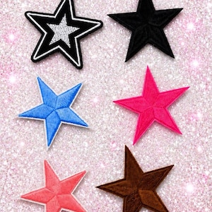 May include: Six embroidered star-shaped patches arranged in two columns. The top left is black and white, the top right is solid black, the middle left is blue, the middle right is hot pink, the bottom left is coral, and the bottom right is brown.
