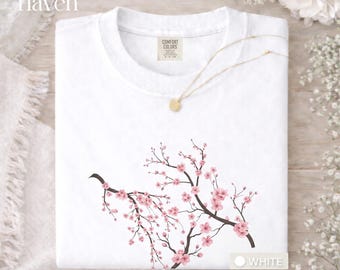 Camiseta Flor de Cerejeira | Camiseta Flor de Sakura | Camiseta Floral com Estética Japonesa | Camiseta com Estampa de Galhos Botânicos | Presente Delicado para Meninas | Blusa Inspirada na Natureza
