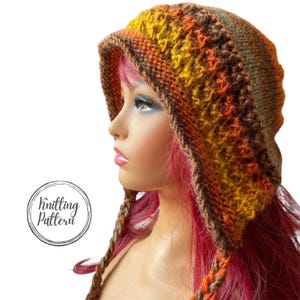 May include: A knitted hood in shades of brown, orange, and yellow, with a textured pattern. The hood has a brim and braided ties. The text "Knitting Pattern" is in a circle on the lower left.