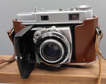 Cámara Kodak Retina IIc de 35 mm de estilo vintage, objetivo Schneider Xenon de 50 mm f/2.8, estuche de cuero.