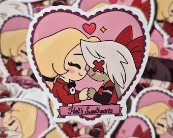 May include: A sticker featuring two cartoon characters embracing inside a pink heart with a scalloped border. The characters are in red and black outfits. The text "Hell's Sweethearts" is on a banner below.