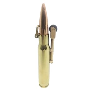 bullet shaped cigarette lighter WWII This was never a real bullet, meant to look like one but was always made as a lighter. These bullet lighters were commonly used by soldiers during the Second Bullet Lighter Buying Guide: Fuel,