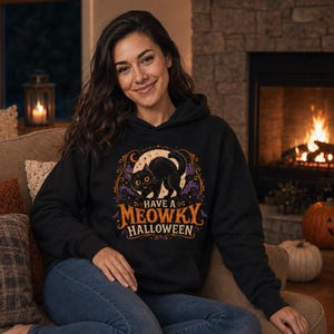 Een schattige Halloween-hoodie met een miauwend katje, een leuk cadeau voor kattenliefhebbers.
