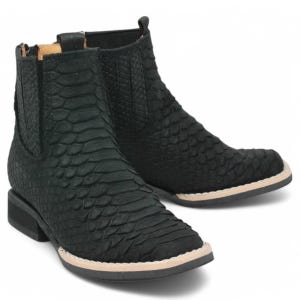 May include: Black ankle boots with a textured, snake-like pattern. The boots have a square toe and a light-colored sole trim. The design includes elastic side panels for easy wear. The boots are made of a material that mimics the look of snakeskin.